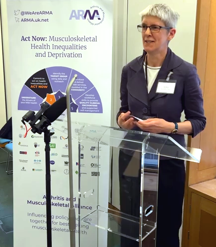 Sue speaking at the report launch event